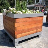 Metal flower planters with wooden decoration